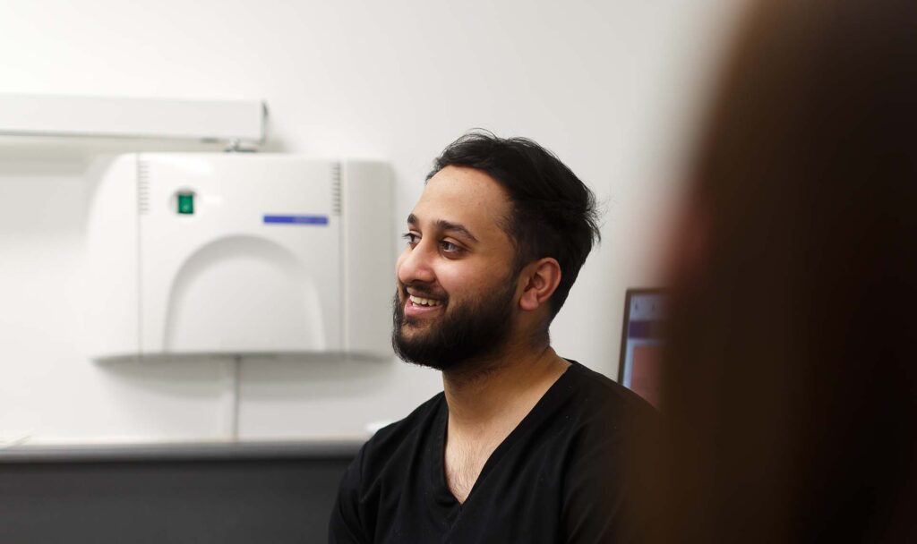Photo of Dr. Raheel Idrees in treatment room, Skipton Road Dental, Colne